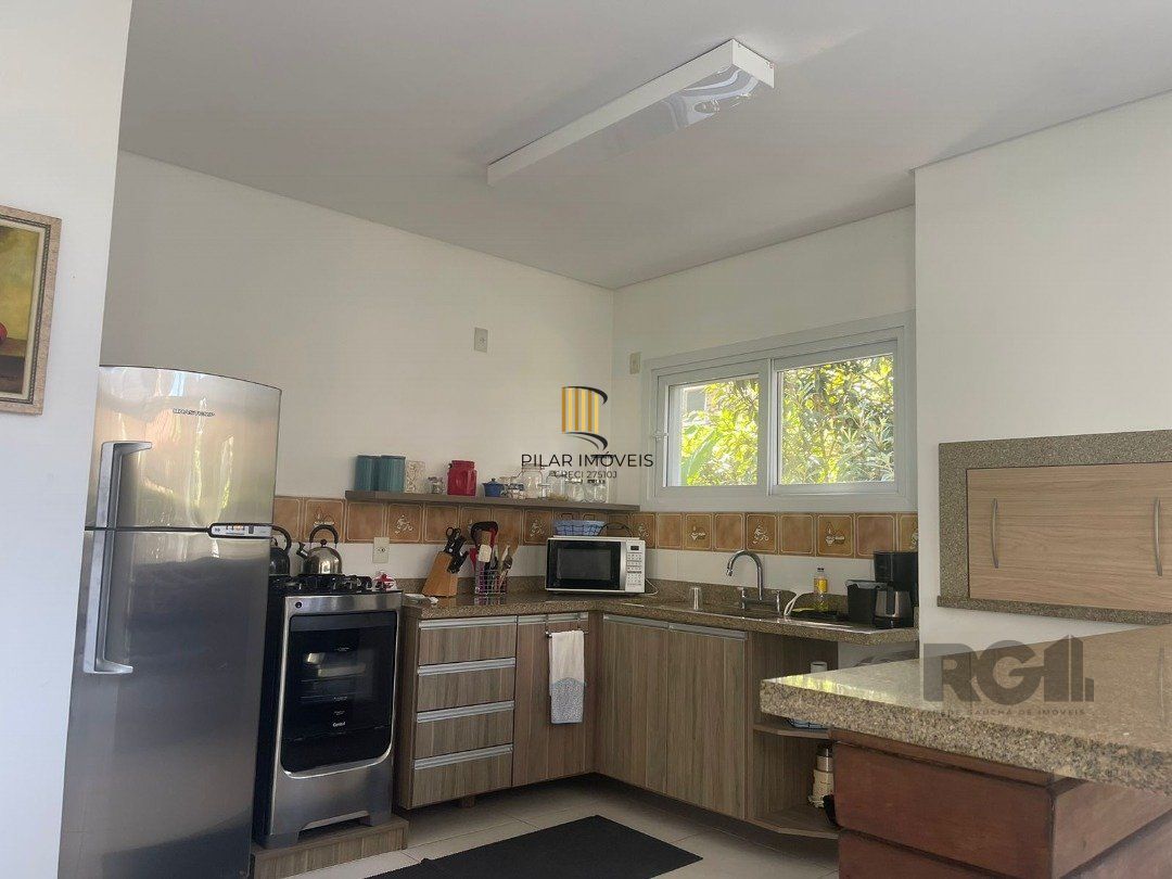 Casa de Condomínio 3 dormitórios no bairro Atlântida Sul