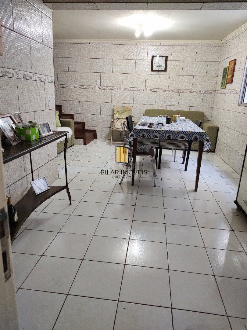 Casa 3 dormitórios no bairro Partenon