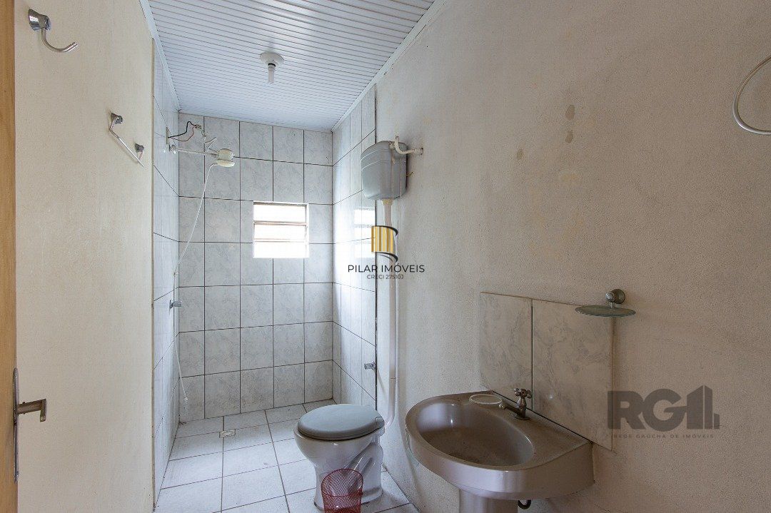 Casa 5 dormitórios no bairro Ipanema