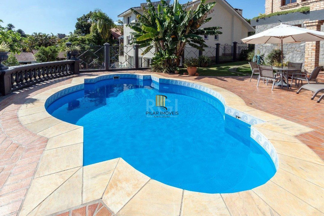 Casa Condominio para Venda - 559m², 4 dormitórios, sendo 3 suites, 3 vagas - Cavalhada