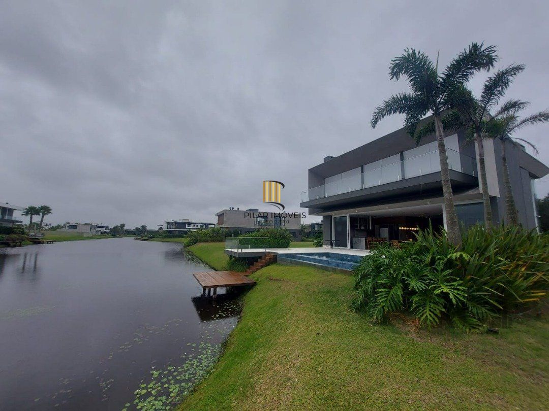 Sobrado Beira Lago com piscina e Deck com 457m² e 5 suítes no Condomínio Sense em Xangri-lá