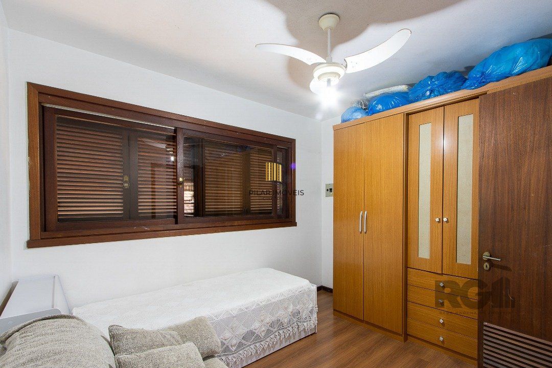 Casa de Condomínio 6 dormitórios no bairro Cavalhada