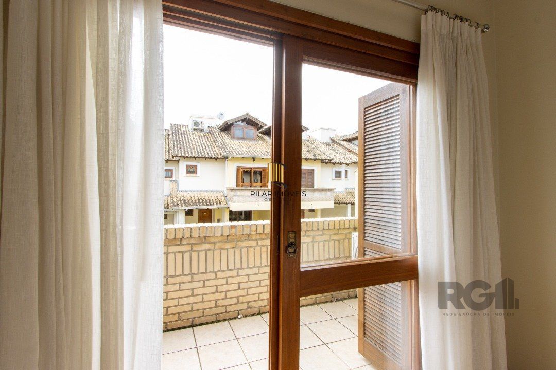 Casa de Condomínio 3 dormitórios no bairro Cavalhada
