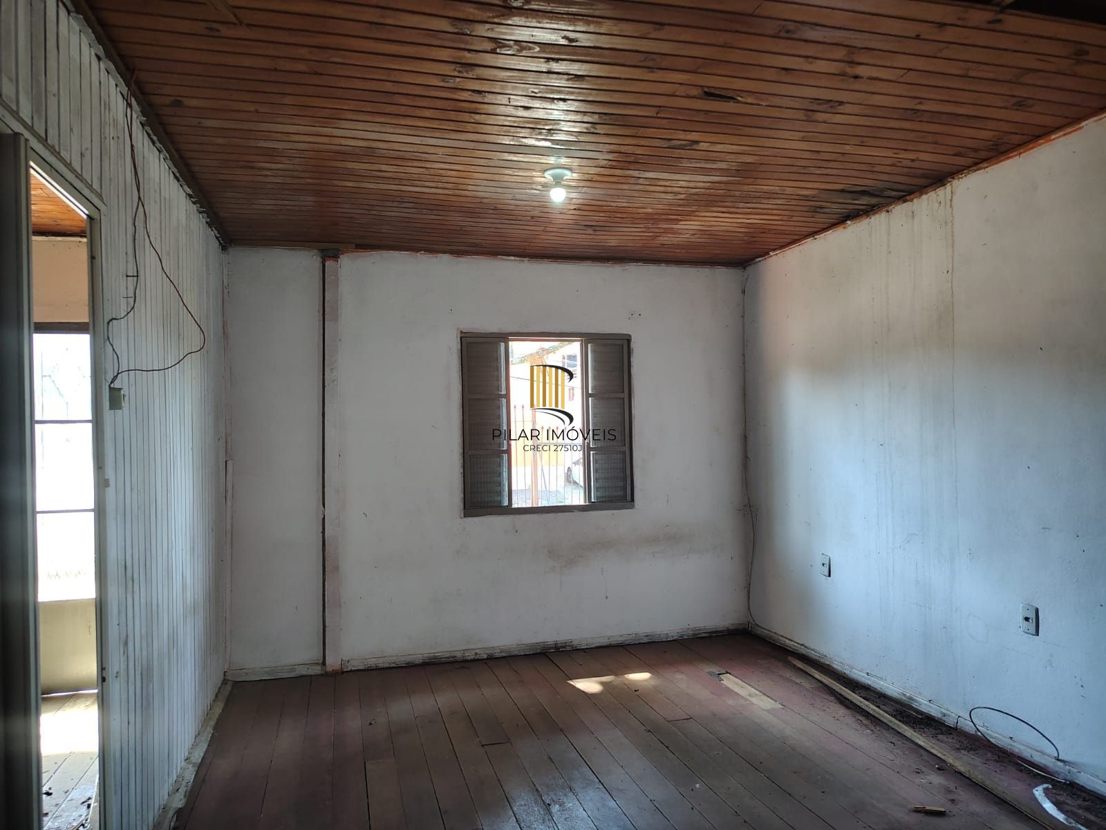 Casa térrea no bairro Vila Nova.