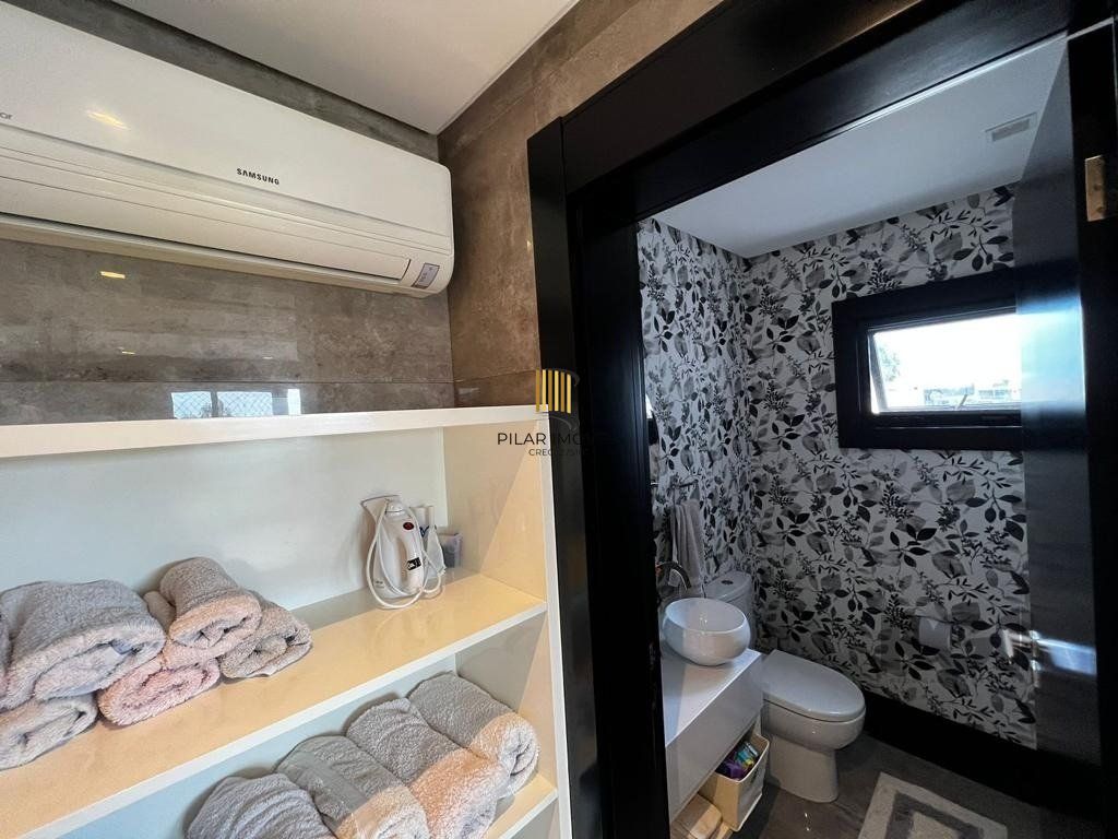 Casa de Condomínio 6 dormitórios no bairro Atlântida Sul
