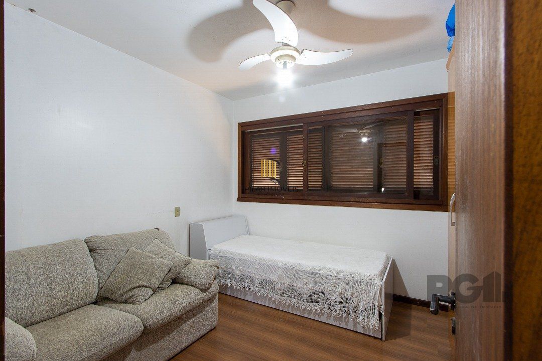 Casa de Condomínio 6 dormitórios no bairro Cavalhada