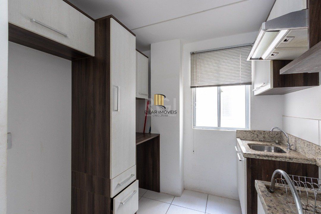 Apartamento 2 dormitórios , sala com dois ambientes , cozinha americana sacada com churrasqueira 1 vaga