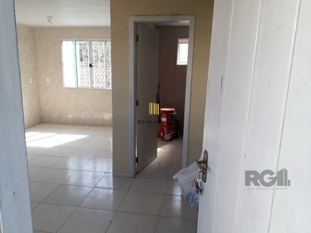 Oportunidade Imperdível: Prédio com 4 Apartamentos, Pátio e 2 Vagas de Garagem