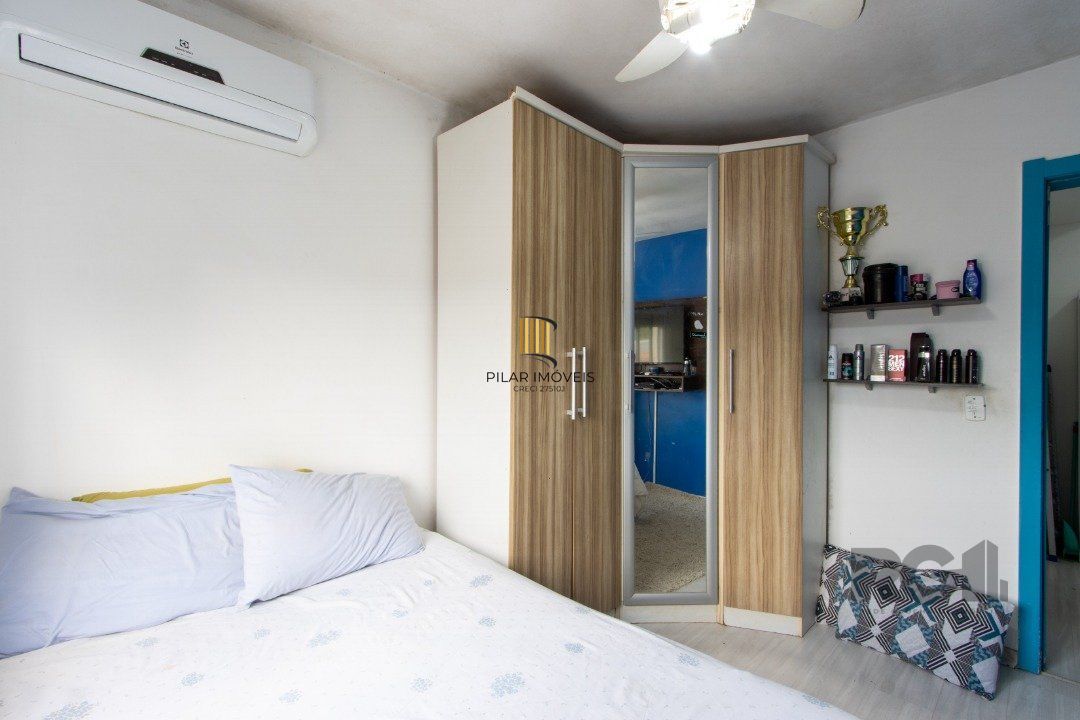 Casa 3 dormitórios no bairro Camaquã