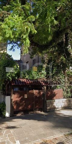 Prédio com total de três pavimentos, para moradia, lojas e apartamentos