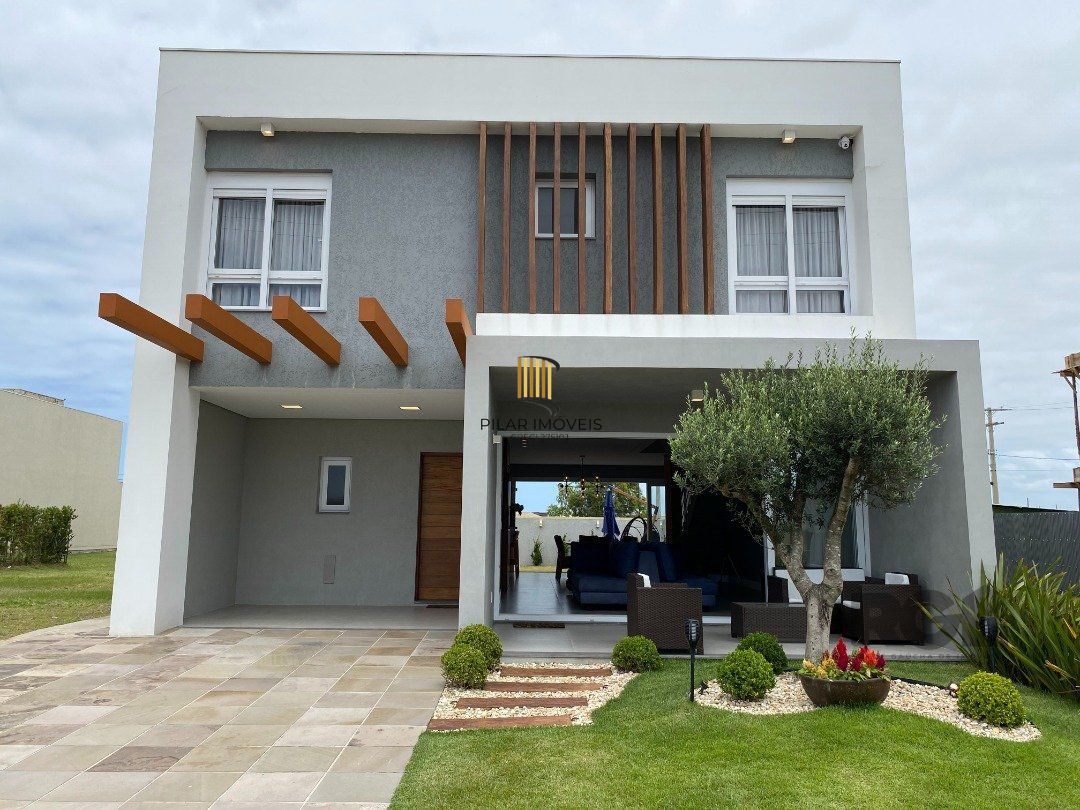 Casa de Condomínio 4 dormitórios no bairro Atlântida Sul - Pilar Imóveis