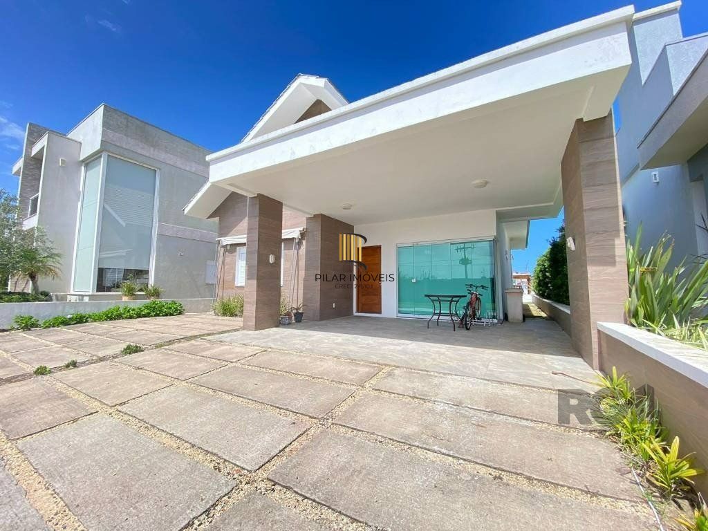 Casa a venda em Condomínio fechado na Beira mar de Atlântida Sul com 3 quartos e 164m²