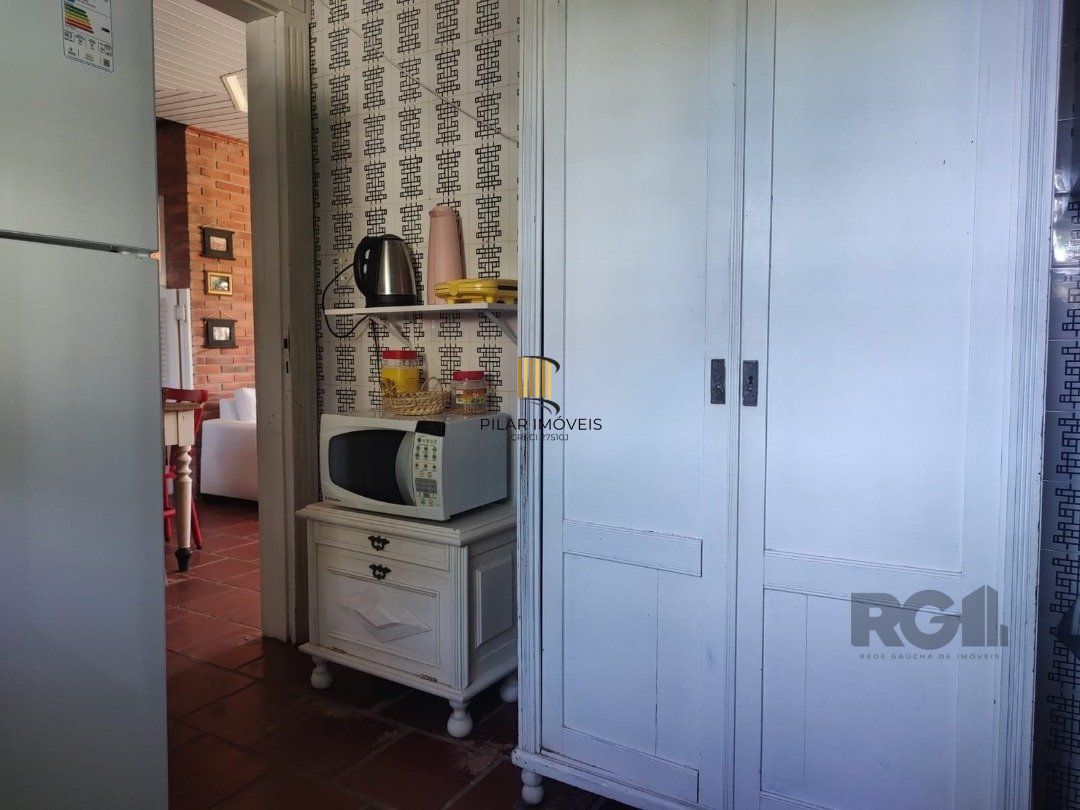 Casa 5 dormitórios no bairro Atlântida