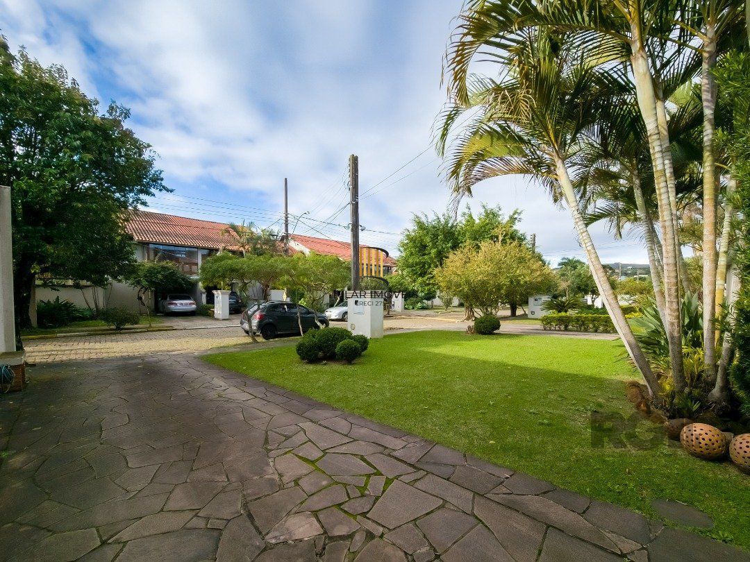 Casa de Condomínio 3 dormitórios no bairro Cavalhada