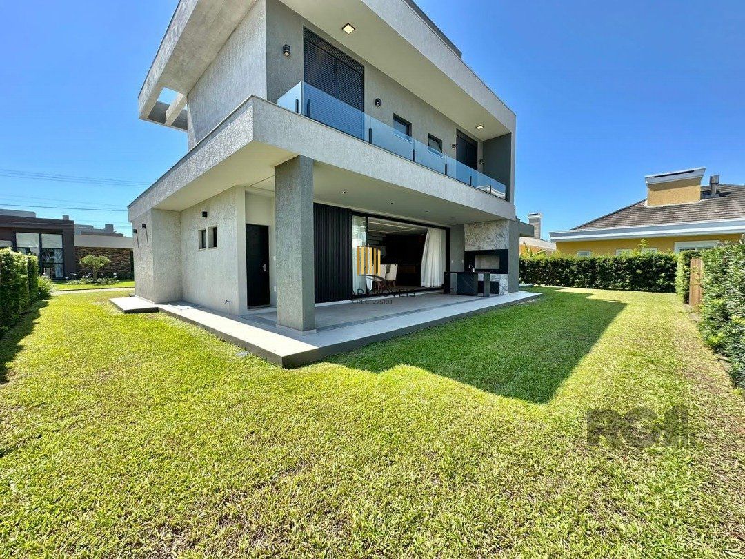 Casa de Condomínio 4 dormitórios no bairro Atlântida