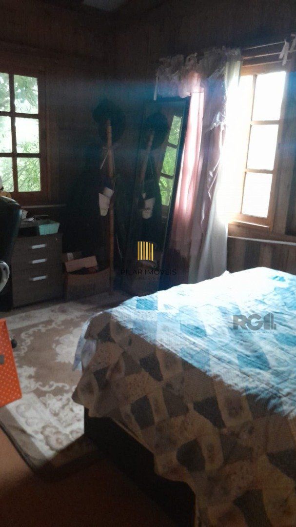 Casa 6 dormitórios no bairro Ponta Grossa