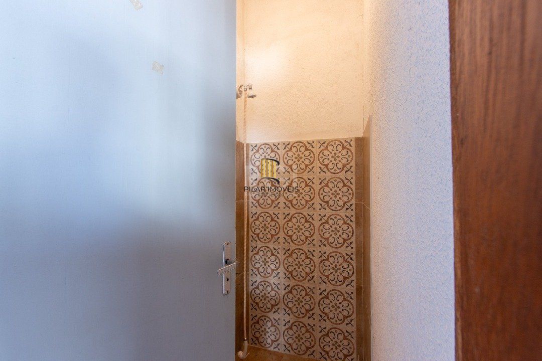 Casa 3 dormitórios no bairro Guarujá