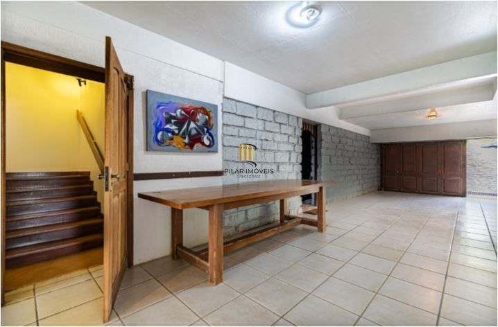 Casa em Condomínio à venda com 5 dormitórios, 565m² e 4 vagas no Condominio Jardim do Sol, Zona Sul de Porto Alegre