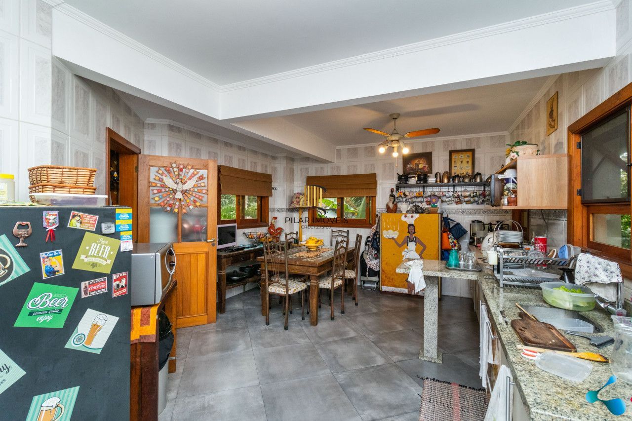 Casa 4 dormitórios no bairro Tristeza