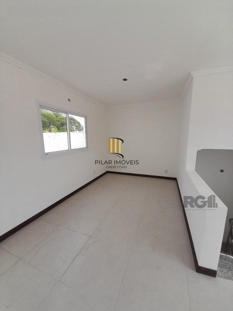 Casa 3 dormitórios no bairro Camaquã