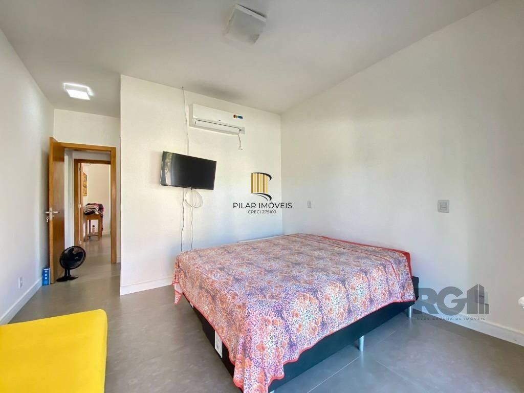 Casa a venda em Condomínio fechado na Beira mar de Atlântida Sul com 3 quartos e 164m²