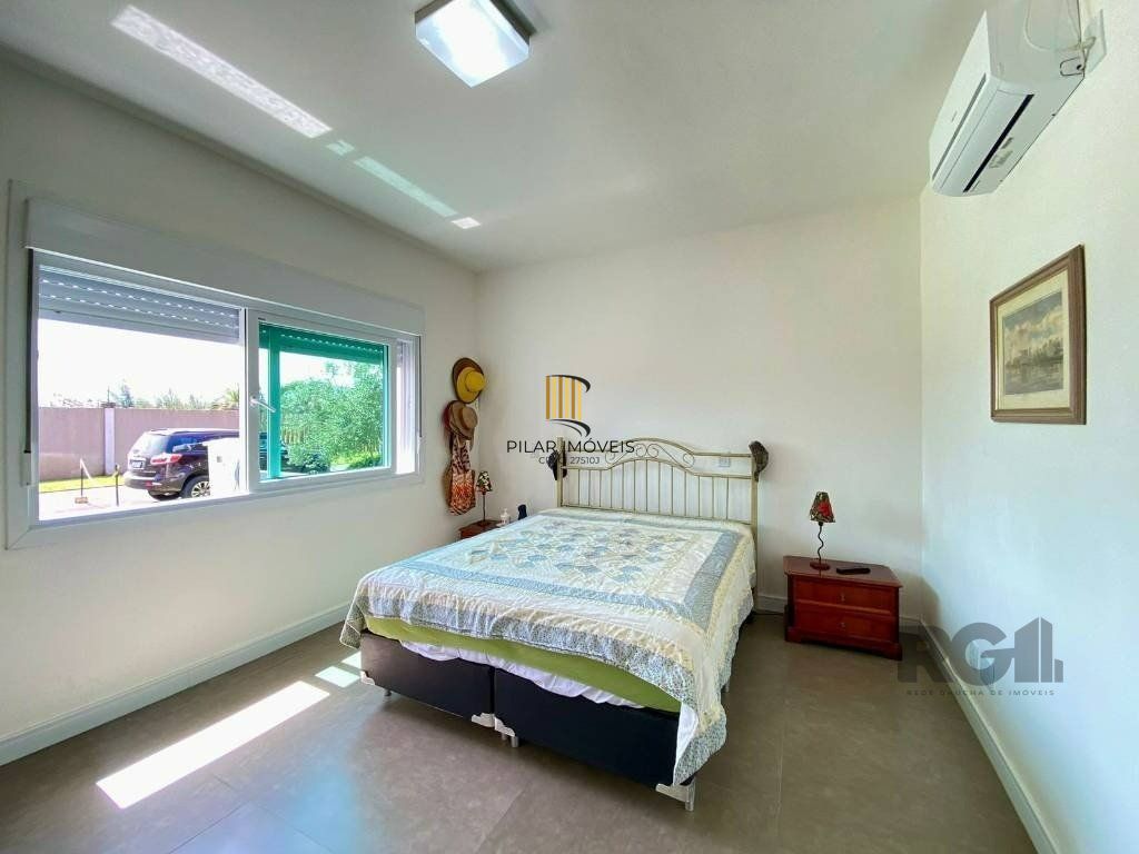Casa a venda em Condomínio fechado na Beira mar de Atlântida Sul com 3 quartos e 164m²