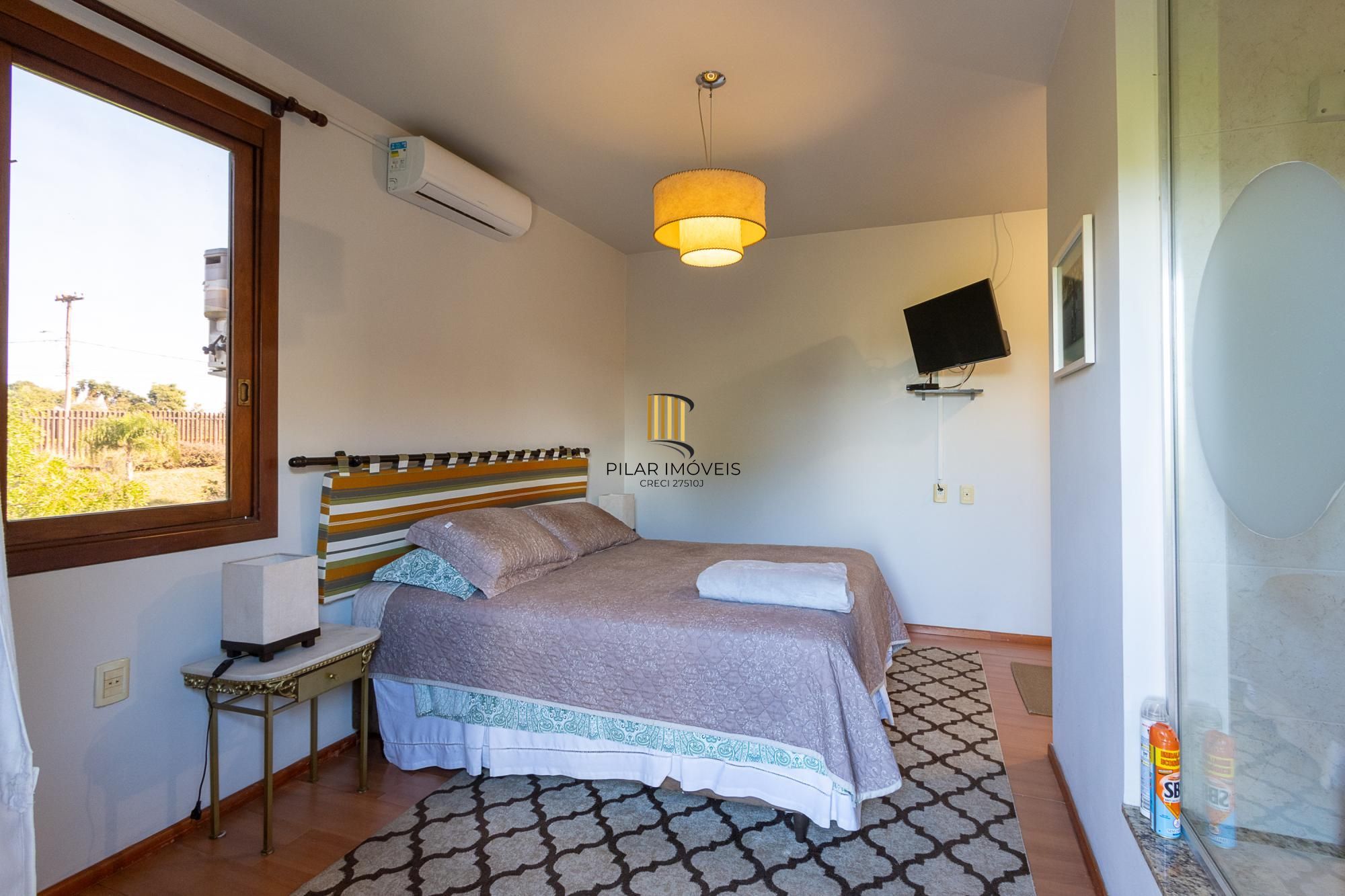 Casa em condomínio á venda com 6 dormitórios em Porto Alegre