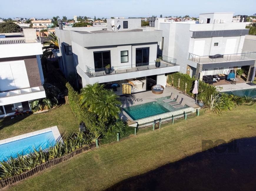 Casa de Condomínio 5 dormitórios no bairro Xangri-la