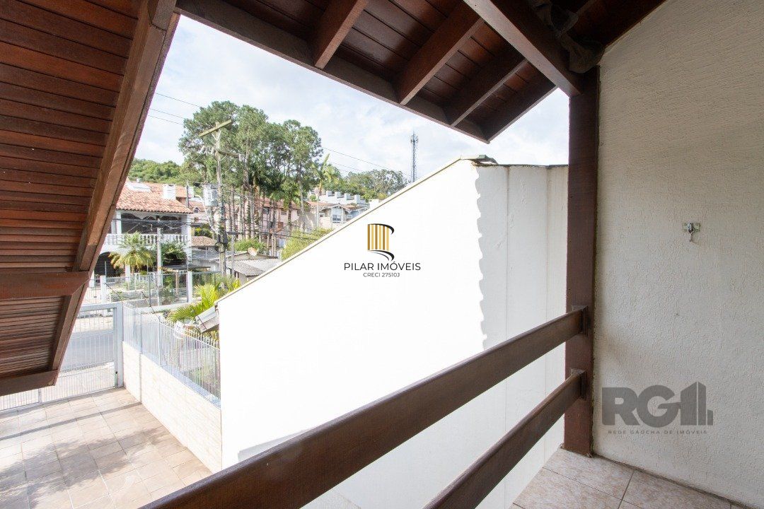 Casa 3 dormitórios no bairro Camaquã
