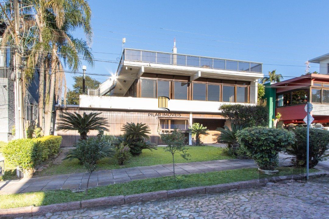 Casa em condomínio que possui  3 dormitórios, sendo 1suíte, lavabo, escritório, possibilidade de um 4 dormitório, - Pilar Imóveis