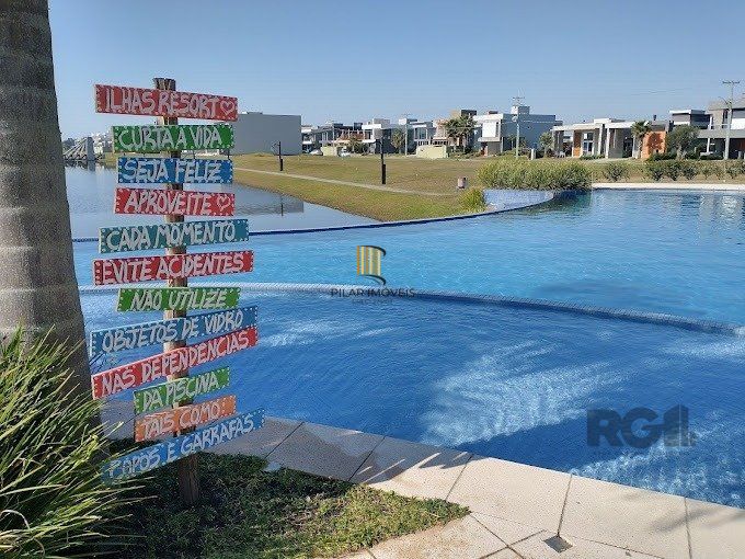 Casa de Condomínio 5 dormitórios no bairro Capão Ilhas Resort