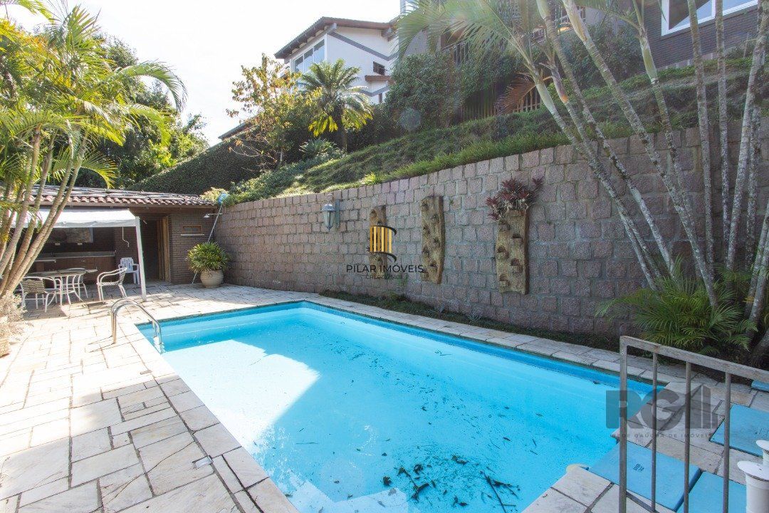Casa deslumbrante vista do Guaiba, 3 dormitórios, sendo 1 suite master com closet e banheira de hidro com vista para o rio