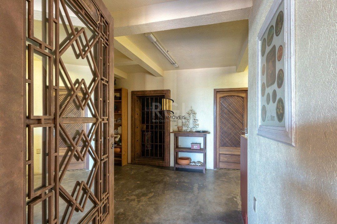 Casa Condominio para Venda - 559m², 4 dormitórios, sendo 3 suites, 3 vagas - Cavalhada