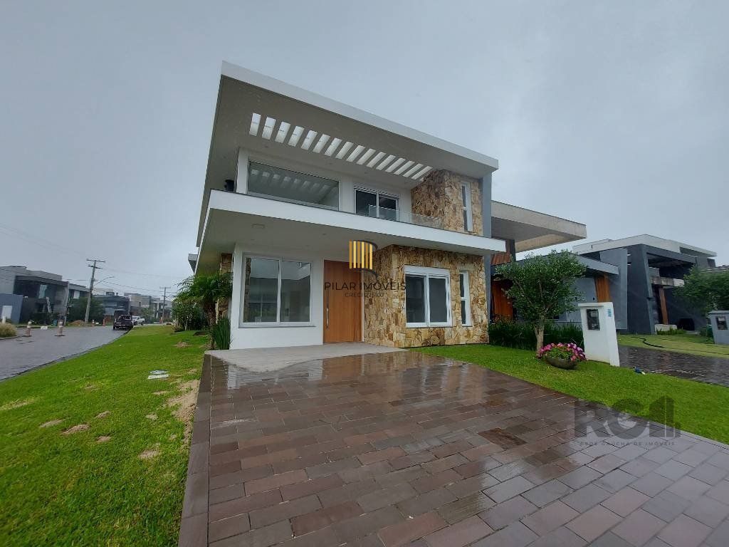 Casa de Condomínio 4 dormitórios no bairro Atlântida Sul - Pilar Imóveis
