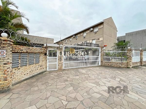 Casa de Condomínio 3 dormitórios no bairro Cavalhada
