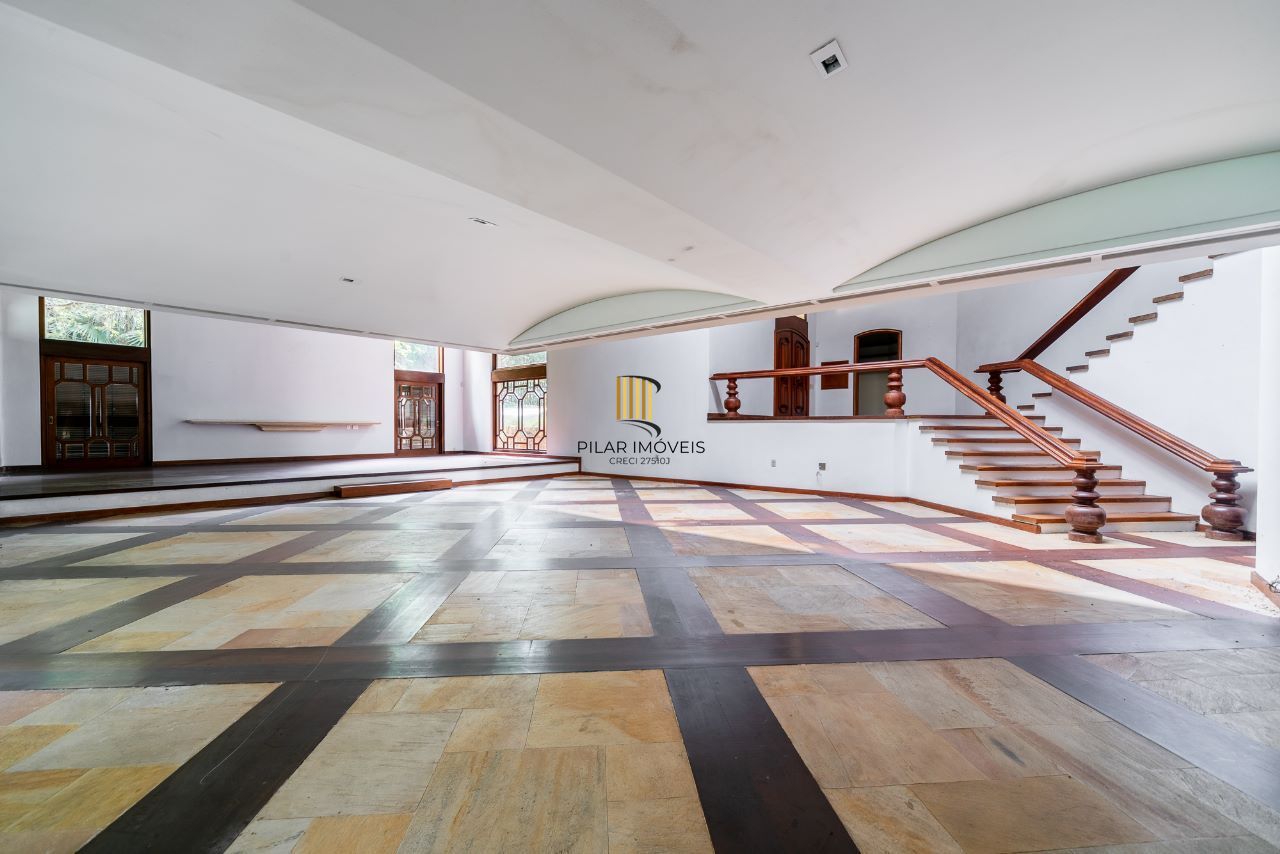 Casa à venda com1981m², 13 dormitórios, 4 suítes, 30 vagas, terreno de 1,2 hectares, no bairro Pedra Redonda em Porto Alegre