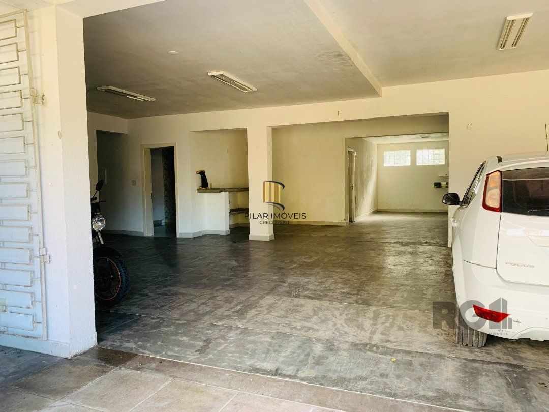 Casa de Condomínio 3 dormitórios no bairro Lomba do Pinheiro