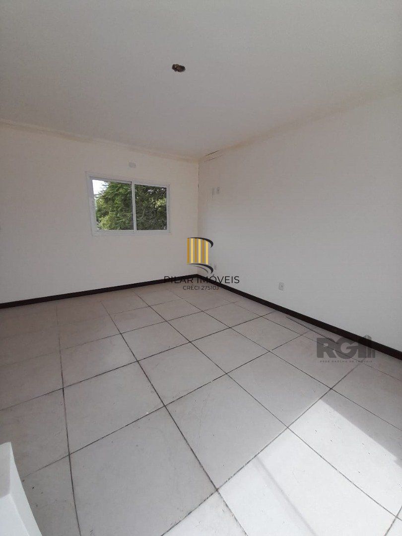 Casa de Condomínio 3 dormitórios no bairro Camaquã