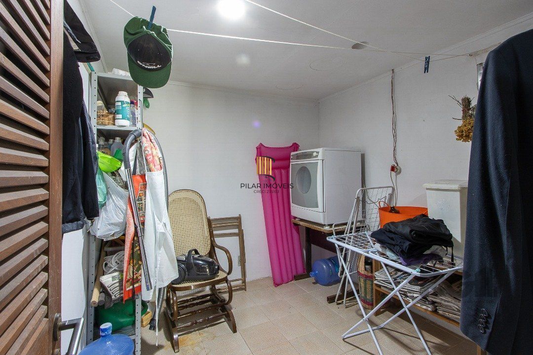 Casa de Condomínio 6 dormitórios no bairro Cavalhada