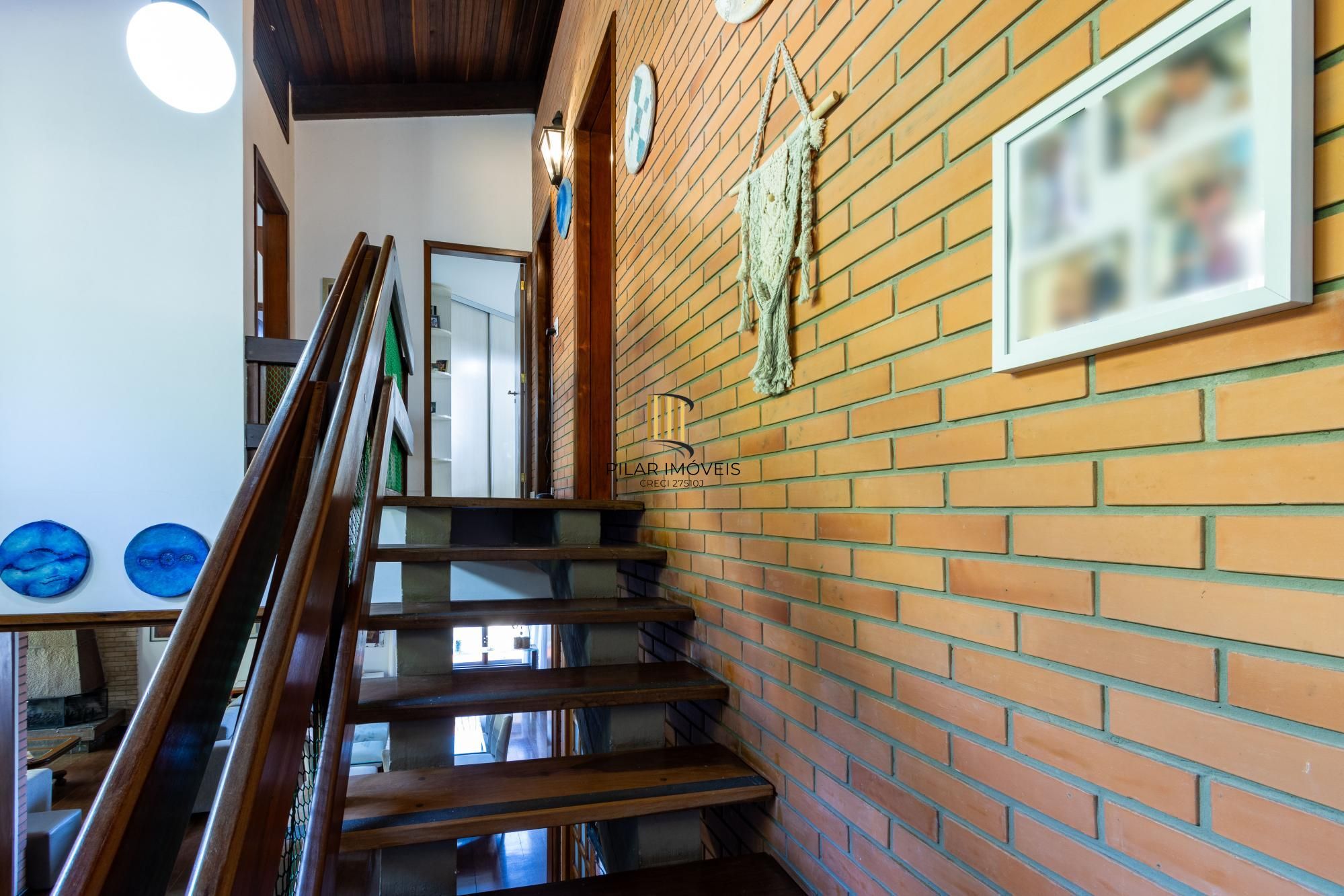 Casa de Condomínio 4 dormitórios no bairro Cavalhada