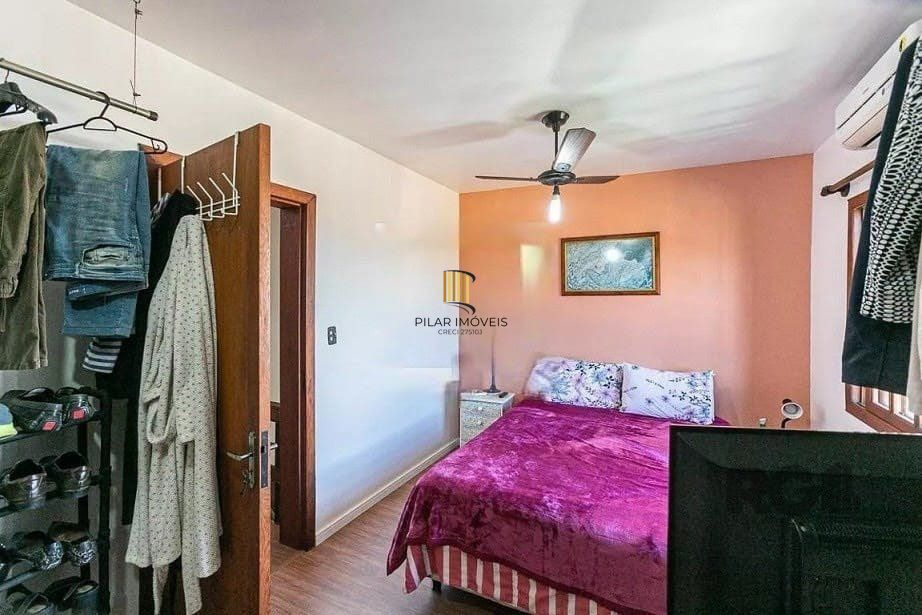 Casa com 161m² e 3 dormitórios com suíte, piscina no bairro Espírito Santo em PORTO ALEGRE