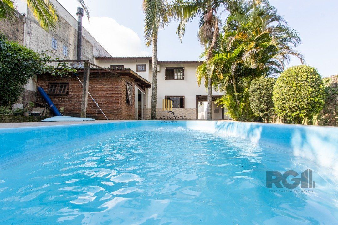 Casa 3 dormitórios no bairro Camaquã