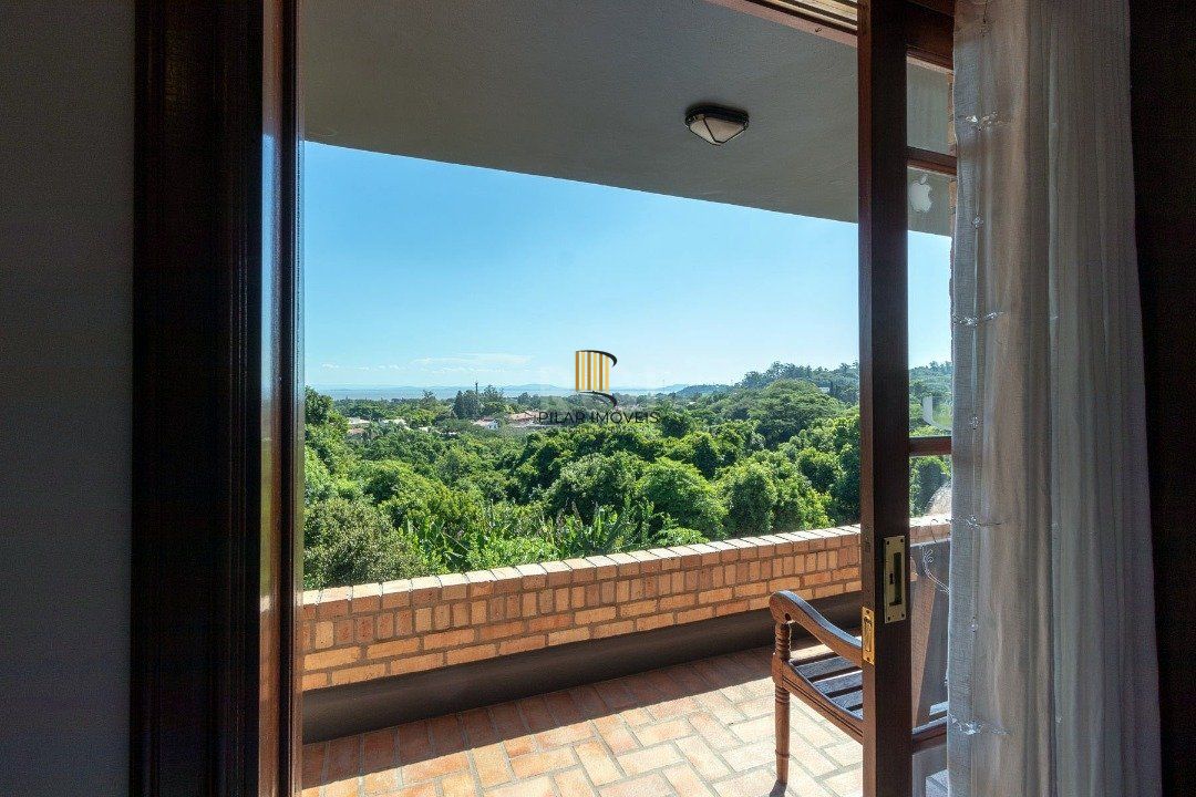 Casa Condominio para Venda - 559m², 4 dormitórios, sendo 3 suites, 3 vagas - Cavalhada