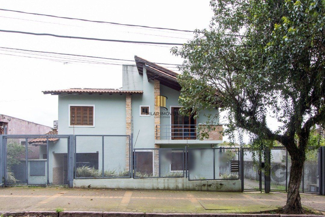 Casa de Condomínio 3 dormitórios no bairro Camaquã
