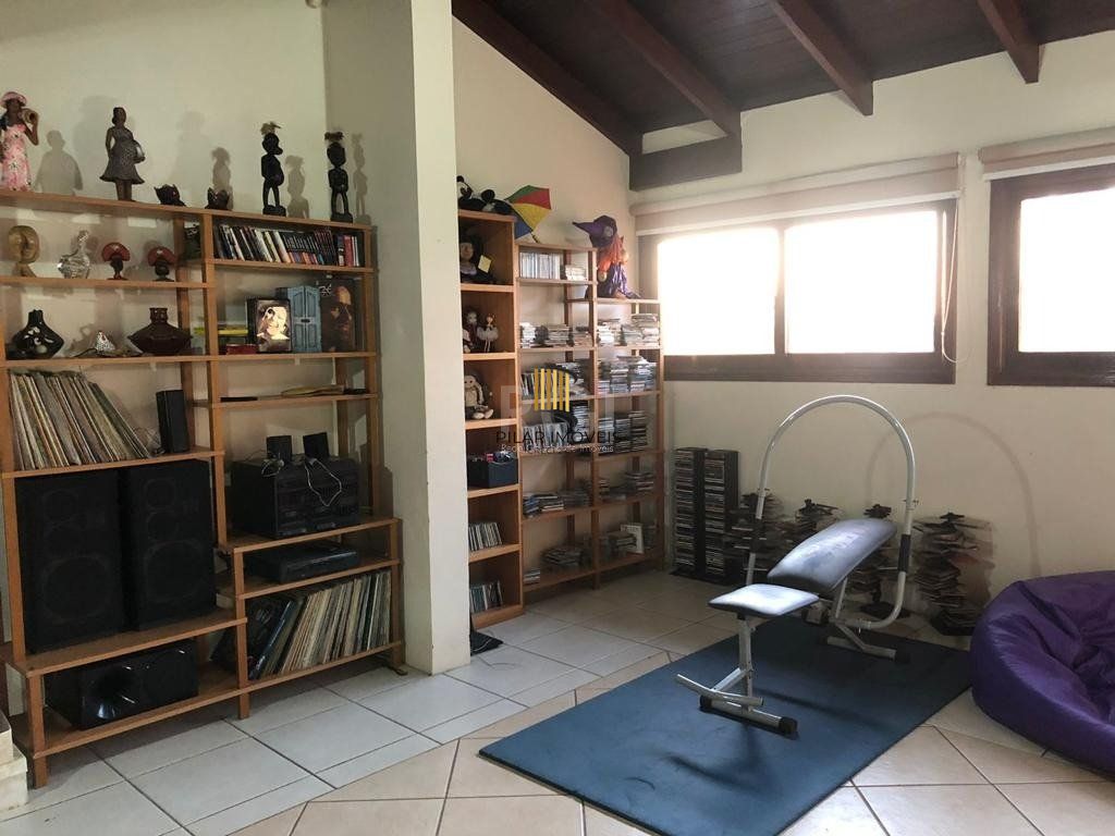 Casa de Condomínio 4 dormitórios no bairro Cavalhada