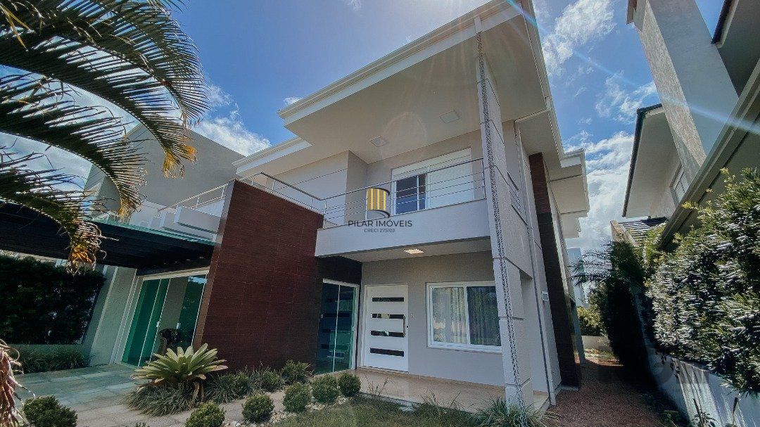 Casa de Condomínio 5 dormitórios no bairro Zona Nova