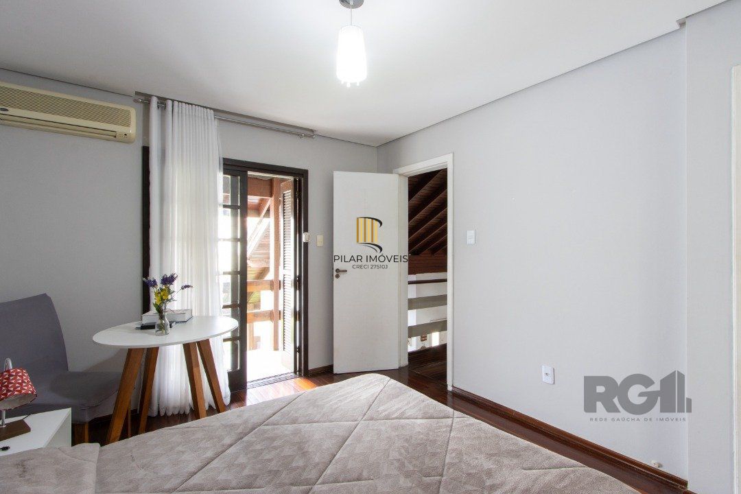Casa 3 dormitórios no bairro Camaquã