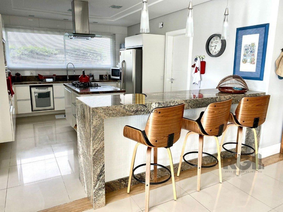 Casa de Condomínio 4 dormitórios no bairro Atlântida