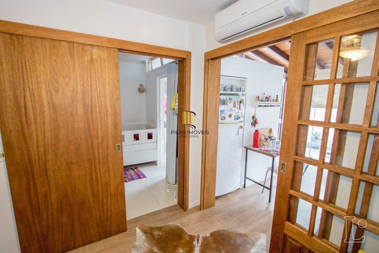 Casa de Condomínio 4 dormitórios no bairro Cavalhada