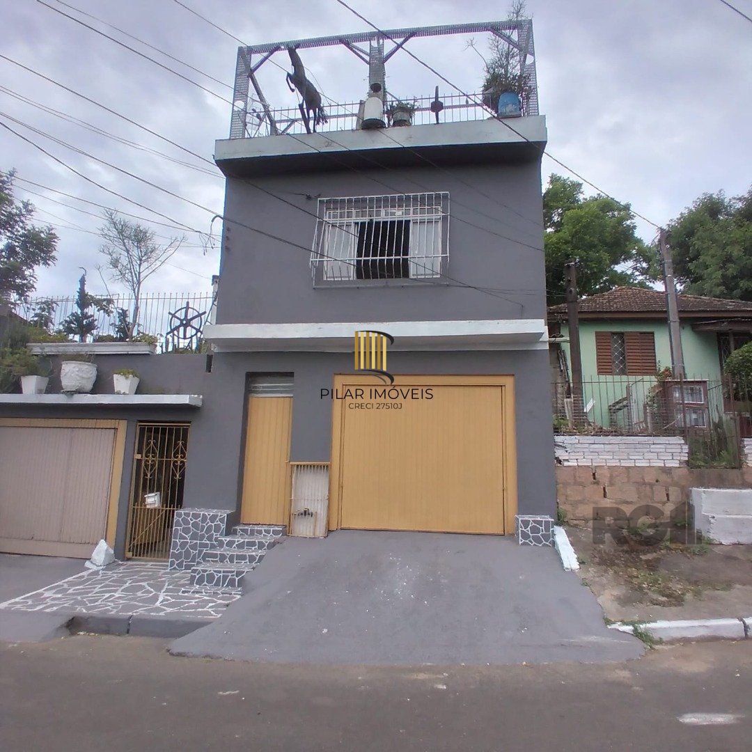 Casa 8 dormitórios no bairro Cavalhada - Pilar Imóveis